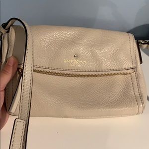 Kate Spade cream pebbled leather crossbody purse